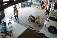 Hiện trường vụ nổ súng. (Ảnh chụp màn hình từ camera an ninh)