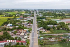 Quốc lộ 22 sẽ giảm tải giao thông khi cao tốc Thành phố Hồ Chí Minh-Mộc Bài đi vào hoạt động. (Ảnh: Giang Phương/TTXVN)