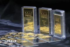 Vàng miếng được bày bán tại sàn giao dịch ở Seoul, Hàn Quốc. (Ảnh: Yonhap/TTXVN)
