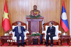 Tổng Bí thư Tô Lâm gặp nguyên Tổng Bí thư, Chủ tịch nước Lào Choummaly Sayasone. (Ảnh: Thống Nhất/TTXVN)