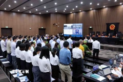 Hình ảnh tại phiên tòa xét xử sơ thẩm vụ án xảy ra tại Tập đoàn FLC. (Ảnh: Phạm Kiên/TTXVN)