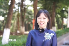 Phó Trưởng ban Tuyên giáo và Dân vận Tỉnh ủy Lai Châu Đào Thị Thanh Nhàn góp ý vào dự thảo các văn kiện trình Đại hội XIV của Đảng. (Ảnh: Việt Dũng/TTXVN)