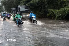 Hình ảnh mưa gây ngập ở Hà Nội hôm 30/6. (Ảnh: Thành Phương/TTXVN)