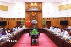Thủ tướng Phạm Minh Chính chủ trì cuộc họp về dự thảo phát triển giáo dục, đào tạo và chăm sóc sức khoẻ nhân dân. (Ảnh: Dương Giang/TTXVN)