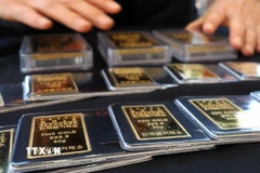 Vàng miếng được bày bán tại sàn giao dịch ở Seoul, Hàn Quốc. (Ảnh: Yonhap/TTXVN)