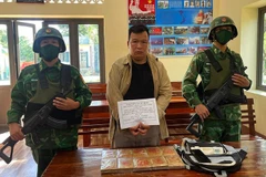Đối tượng Tòng Văn Quí cùng tang vật tại cơ quan chức năng.