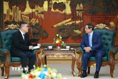 Thủ tướng Phạm Minh Chính tiếp ông Hồng Thiên Chúc, Chủ tịch Tập đoàn Texhong (Trung Quốc). (Ảnh: Dương Giang/TTXVN)