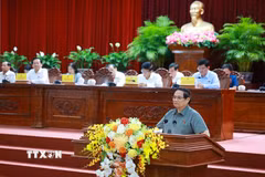 Thủ tướng Phạm Minh Chính phát biểu tại hội nghị tiếp xúc cử tri thành phố Cần Thơ trước Kỳ họp thứ 10, Quốc hội khóa XV. (Ảnh: Dương Giang/TTXVN)