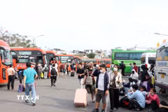 Ngày 26 tháng Chạp, Bến xe miền Tây dự kiến là ngày cao điểm nhất, khi có trên 69.000 lượt hành khách xuất bến. (Ảnh: Tiến Lực/TTXVN)