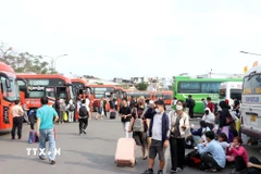 Ngày 26 tháng Chạp, Bến xe miền Tây dự kiến là ngày cao điểm nhất, khi có trên 69.000 lượt hành khách xuất bến. (Ảnh: Tiến Lực/TTXVN)