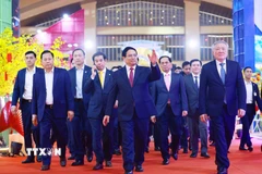 Thủ tướng Phạm Minh Chính đến dự Lễ bế mạc Hội chợ Mùa Xuân lần thứ nhất năm 2026. (Ảnh: Dương Giang/TTXVN)