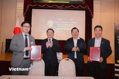 Hội nghị chứng kiến lễ ký các Biên bản Ghi nhớ hợp tác (MOU) giữa các đối tác Việt Nam và Nhật Bản trong lĩnh vực bán dẫn. (Ảnh: Nguyễn Tuyến/Vietnam+)