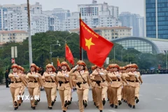 Cán bộ, chiến sỹ Cảnh sát giao thông Hà Nội tham gia các khối diễu hành, phục vụ Lễ xuất quân và diễn tập phương án bảo vệ Đại hội XIV của Đảng. (Ảnh: TTXVN phát)
