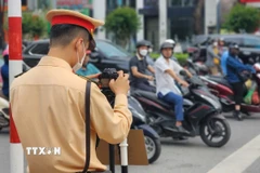 Biện pháp mới nhằm đảm bảo minh bạch khi phạt nguội, đồng thời tăng tính răn đe đối với người tham gia giao thông. (Ảnh: TTXVN phát)