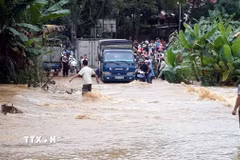 Mưa lớn gây lũ quét. (Ảnh: TTXVN phát)