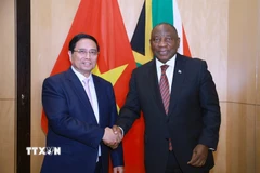Thủ tướng Phạm Minh Chính hội kiến Tổng thống Cộng hòa Nam Phi, Chủ tịch G20 năm 2025, Matamela Cyril Ramaphosa. (Ảnh: Dương Giang/TTXVN)