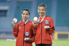 Nguyễn Thị Oanh lần thứ 5 giành HCV chạy 5000m nữ tại SEA Games, Lê Thị Tuyết giành HCB cùng nội dung. (Ảnh: Minh Quyết/TTXVN)
