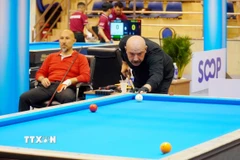 Cơ thủ Secer Zahir (Thổ Nhỹ Kỳ) thi đấu tại World Cup Billiards Carom 3 băng Thành phố Hồ Chí Minh 2025. (Ảnh: Trung Tuyến/TTXVN)