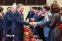 Tổng Bí thư Tô Lâm dự Chương trình giao lưu nghệ thuật "Tâm hồn Nga trong lòng Việt Nam." (Ảnh: Phạm Kiên/TTXVN)