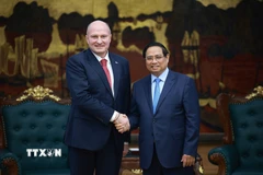 Thủ tướng Phạm Minh Chính tiếp Bộ trưởng Bộ Tình trạng khẩn cấp Liên bang Nga Aleksandr Kurenkov. (Ảnh: Dương Giang/TTXVN)