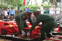 Hài cốt các liệt sỹ quân tình nguyện và chuyên gia Việt Nam được yên nghỉ tại Nghĩa trang liệt sỹ tỉnh Đắk Lắk. (Ảnh: Nguyên Dung/TTXVN)