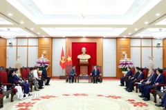 Tổng Bí thư Tô Lâm tiếp ông Vương Lai Thắng, Phó Chủ tịch Tập đoàn Luxshare-ICT, Trung Quốc. (Ảnh: Thống Nhất/TTXVN)