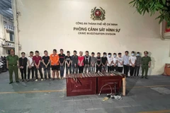 Cơ quan công an đã mời 19 đối tượng liên quan về trụ sở để làm việc. (Ảnh: CA Thành phố Hồ Chí Minh cung cấp)