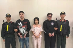 Các đối tượng từ trái sang Quý, Chinh, Huy bị tạm giữ. (Ảnh: PV/Vietnam+)