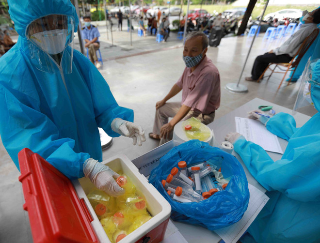 Hà Nội lập đỉnh mới: 895 ca mắc COVID, có 357 ca cộng đồng ảnh 1