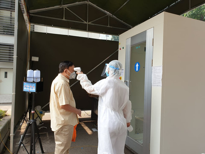  [Photo] Kiểm soát phòng chống dịch chặt chẽ tại Bệnh viện Hữu Nghị ảnh 9