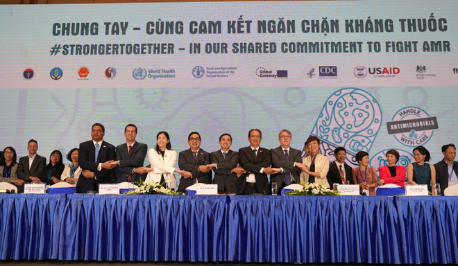 20231117 Shared AMR commitment - hands linking.jpg