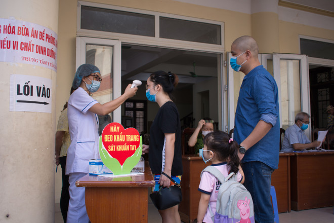 Hà Nội tổ chức 1.800 điểm uống vitamin A liều cao cho trẻ em ảnh 4