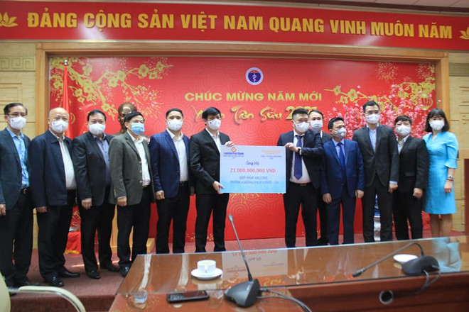 Bộ Y tế tiếp nhận 21 tỷ đồng cho Quỹ mua vắcxin phòng chống dịch COVID-19 từ nhà tài trợ. (Ảnh: PV/Vietnam+) Bộ Y tế tiếp nhận 21 tỷ đồng mua vắcxin phòng chống dịch COVID-19 ảnh 1