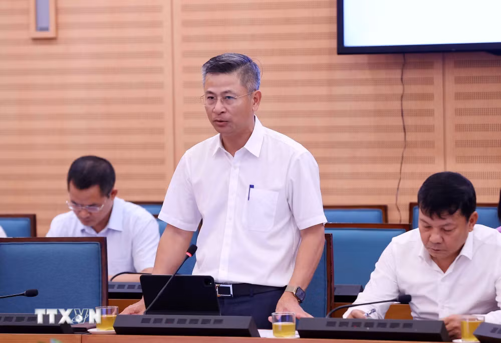 ttxvn-chong-ung-ngap-ha-noi-3.jpg