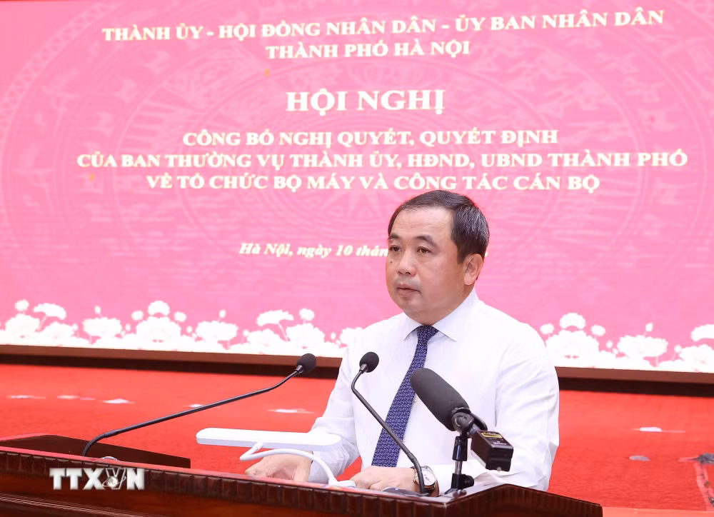 ttxvn-ha-noi-cong-bo-nghi-quyet-quyet-dinh-ve-to-chuc-bo-may-va-cong-tac-can-bo-2.jpg