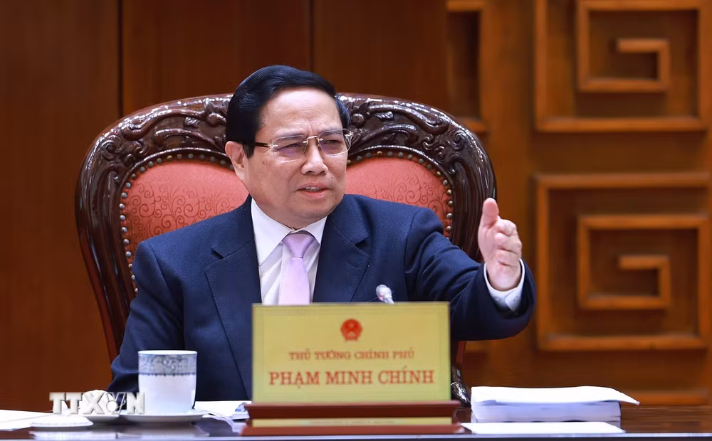 ttxvn-thu-tuong-tinh-gon-bo-may.jpg
