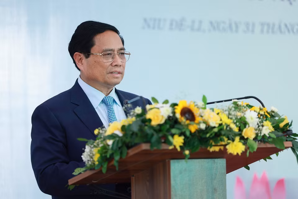 Thủ tướng Phạm Minh Chính phát biểu tại buổi gặp gỡ cán bộ, nhân viên Đại sứ quán và cộng đồng người Việt Nam tại Ấn Độ.​ (Ảnh: Dương Giang/TTXVN)
