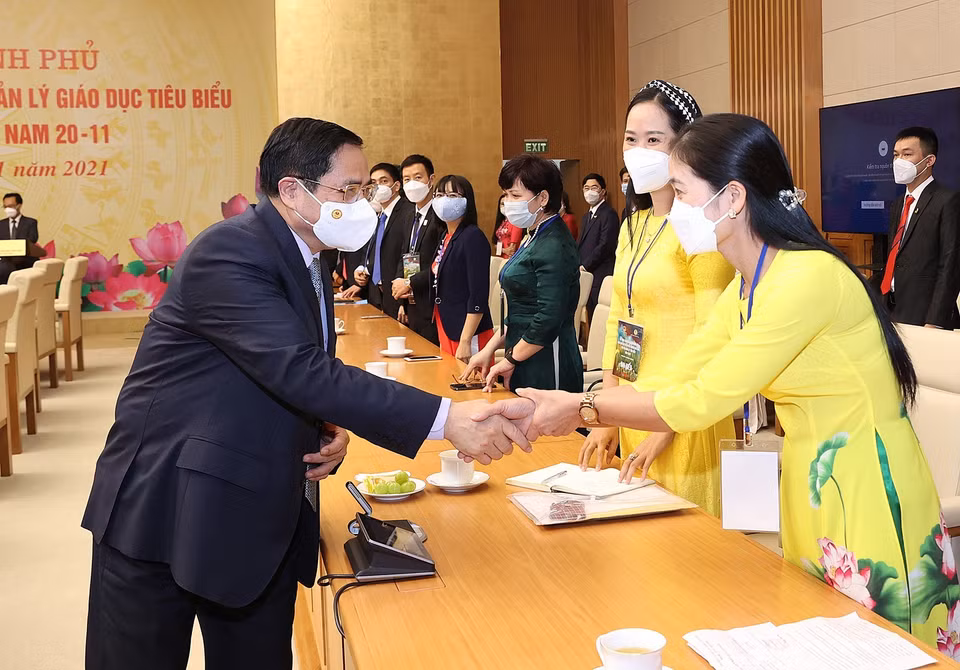 Buổi gặp mặt diễn ra nhân dịp kỷ niệm Ngày Nhà giáo Việt Nam. (Ảnh: Dương Giang/TTXVN)