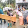Di dời khẩn cấp hộ gia đình bà Lý Thị Thùy. (Nguồn: Báo Thái Nguyên)
