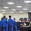 Phiên tòa xét xử 9 bị cáo trong vụ bắt giữ người, đòi nợ hộ. (Nguồn: Báo Lao động)