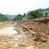 Tuyến Quốc lộ 12, đoạn qua xã Mường Luân, tỉnh Điện Biên bị lũ quét tàn phá với chiều dài hơn 300m. (Ảnh: Phan Quân/TTXVN)