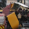 Hiện trường vụ tai nạn tàu điện ở Lisbon, Bồ Đào Nha,. (Ảnh: AFP)