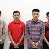 Các đối tượng Triều, Sang, Tấn và Tiền (từ trái qua) tại Cơ quan Công an. (Ảnh: TTXVN phát)