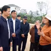 Chủ tịch Ủy ban Nhân dân tỉnh Bắc Ninh Vương Quốc Tuấn nghe người dân phản ánh, kiến nghị. (Ảnh: Thái Hùng/TTXVN)