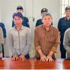 Từ trái qua: Các bị can Lâm Thị Hồng Hạnh, Nguyễn Văn Vũ, Nguyễn Duy Thành, Nguyễn Hữu Vĩnh tại cơ quan công an. (Ảnh: CAAG)