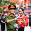 Tình bạn và tình yêu tổ quốc luôn đong đầy trong tim các bạn trẻ Việt Nam. (Ảnh: Vi Nam/Vietnam+)