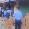 Lực lượng chức năng tại hiện trường kho hàng.(Nguồn: CAND)