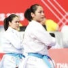 Đội tuyển Karate Việt Nam thi đấu nội dung Kata đồng đội nữ. (Ảnh: TTXVN phát)