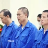 Các bị cáo nghe tuyên án. (Ảnh: TTXVN phát)