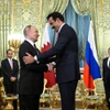 Cuộc gặp giữa Tổng thống Nga Vladimir Putin và Quốc vương Qatar Sheikh Tamim bin Hamad Al-Thani tại Moskva. (Nguồn: Middle East)
